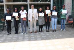 Awardees of the Artesan Gateway 2021 Sustainability challenge posing with their certificates. Prof. Rukwaro dean Faculty of the Built Environment and Design -standing at middle 